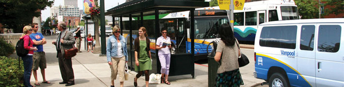 busy street with vanpool bus and link